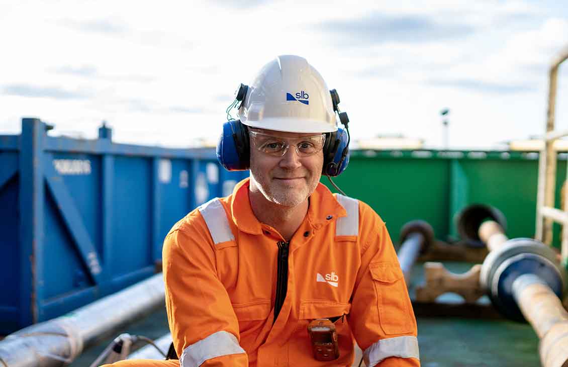 SLB operator at a worksite with PPE equipment on