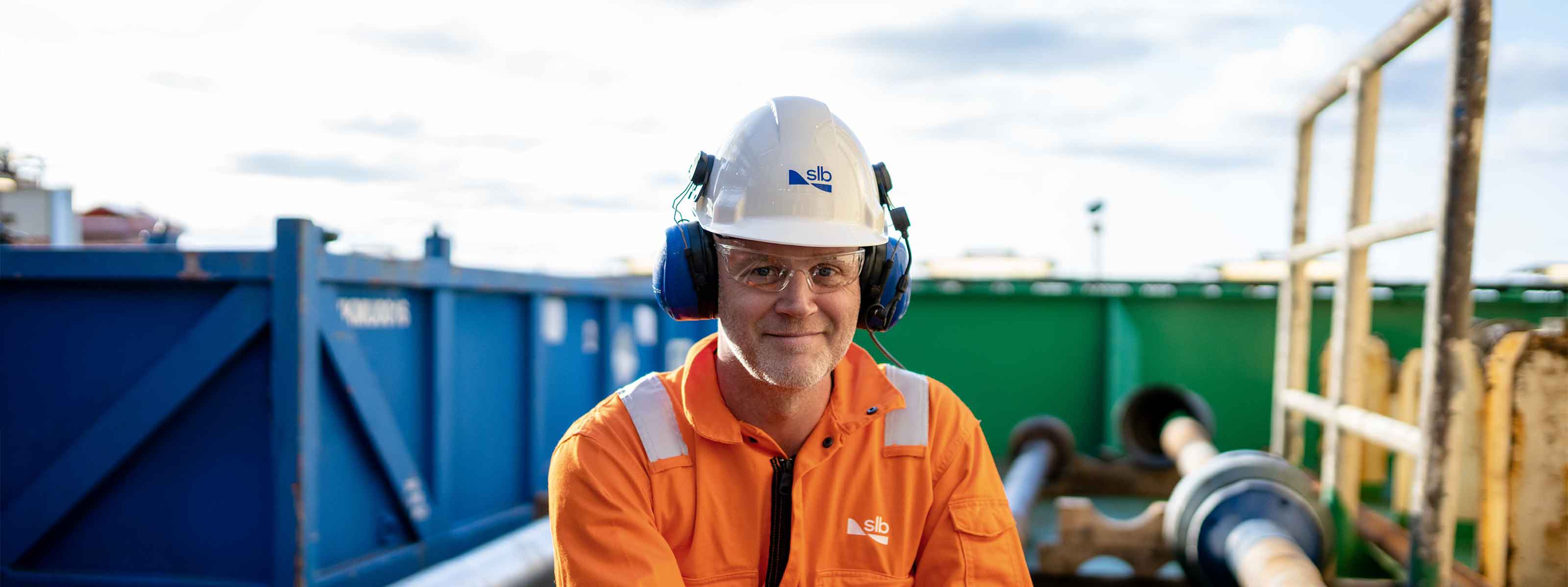 SLB operator at a worksite with PPE equipment on