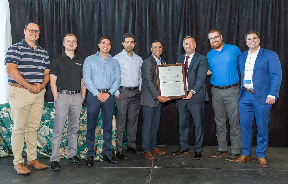 Schlumberger technical experts receiving ASME OTC 2022 Best Paper Award