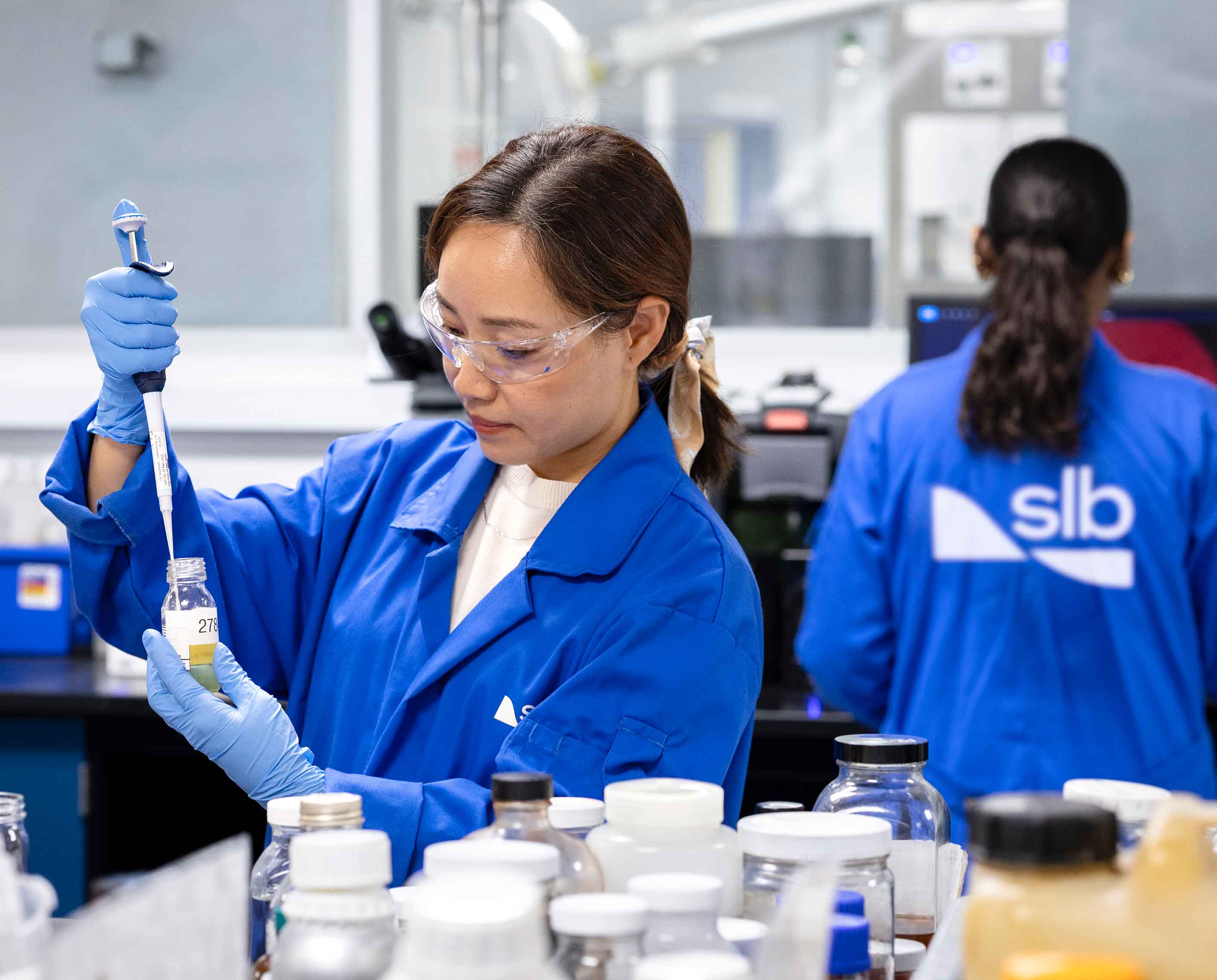 A SLB employee in a lab