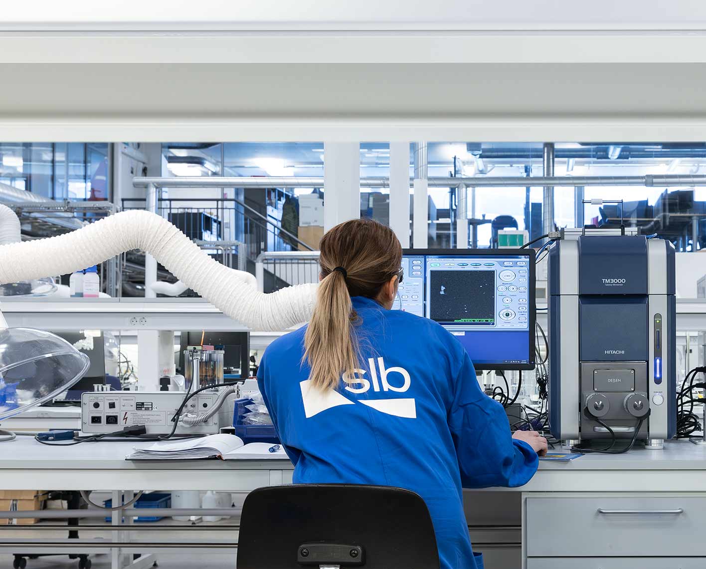 Photo of SLB expert working on scale management