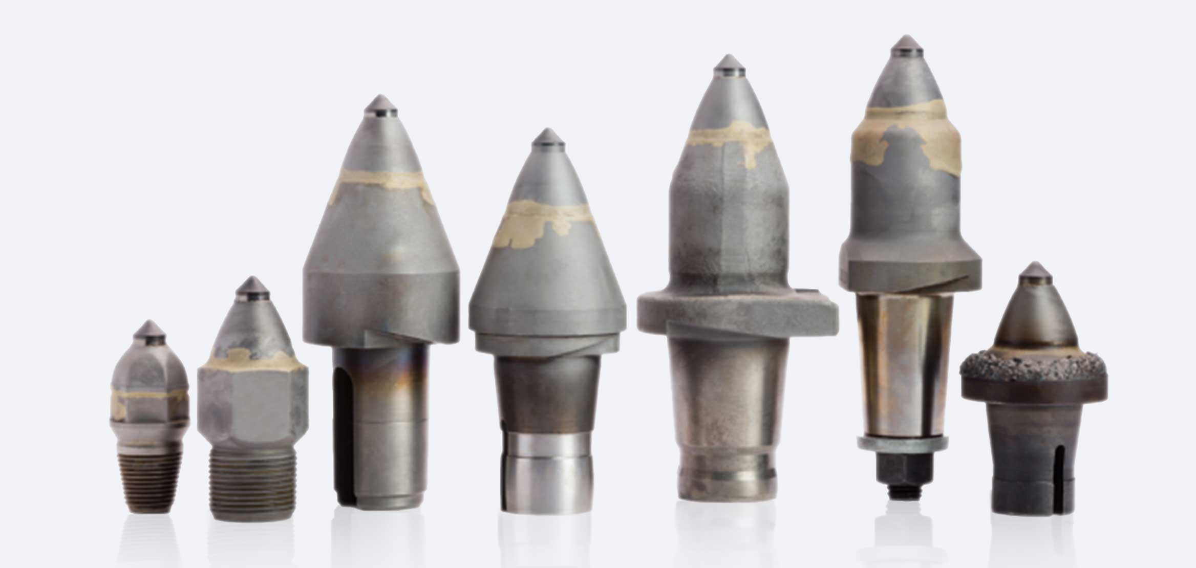 Photo of the wide range of MegaDiamond PCD-tipped picks for the road construction industry.